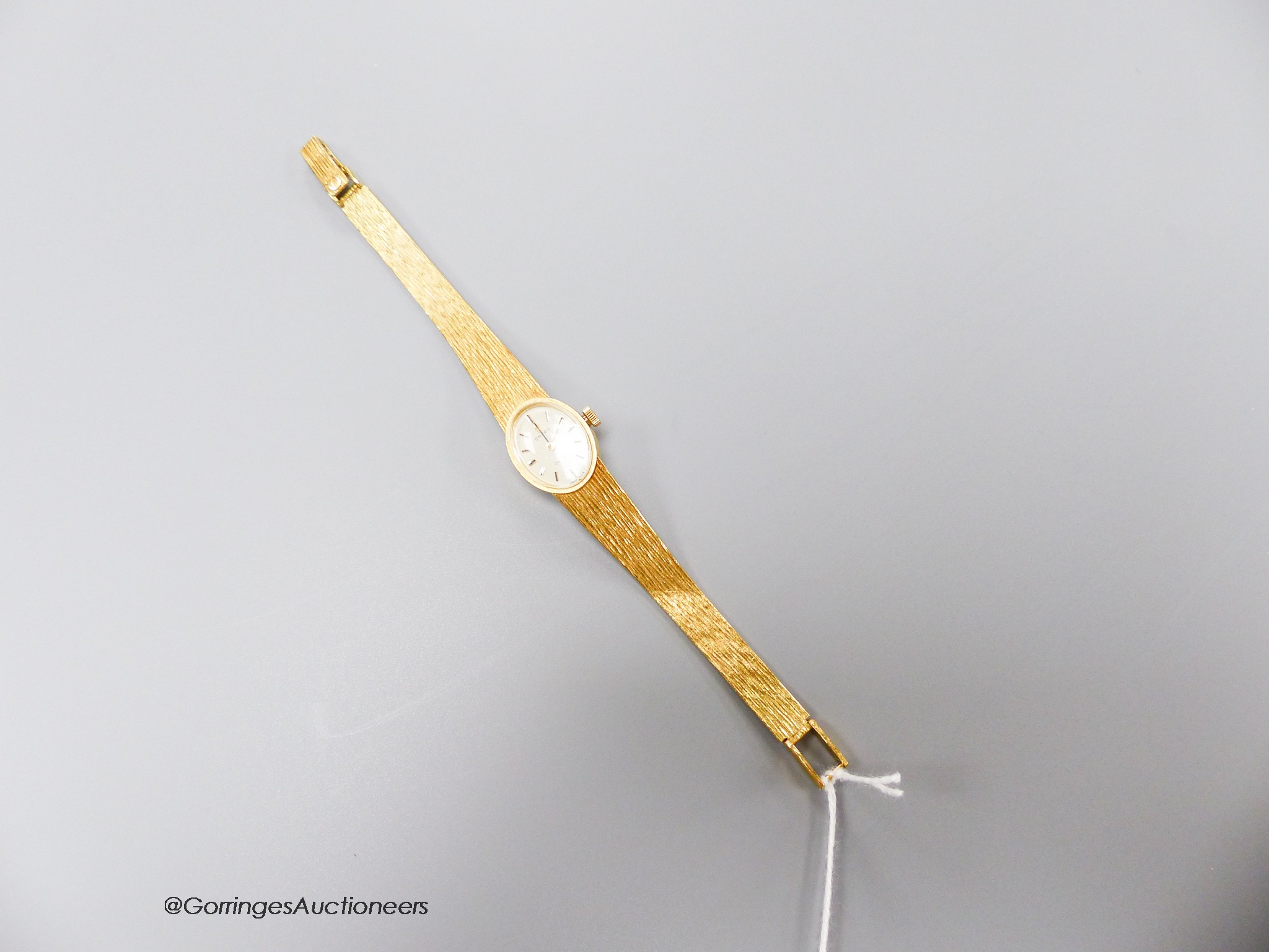 A ladys' 18ct gold Omega manual wind wristwatch